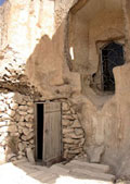 Entrance to the mosque is  formed as a portal arch, several recesses for the deposition of passed away preachers are cutout nearby